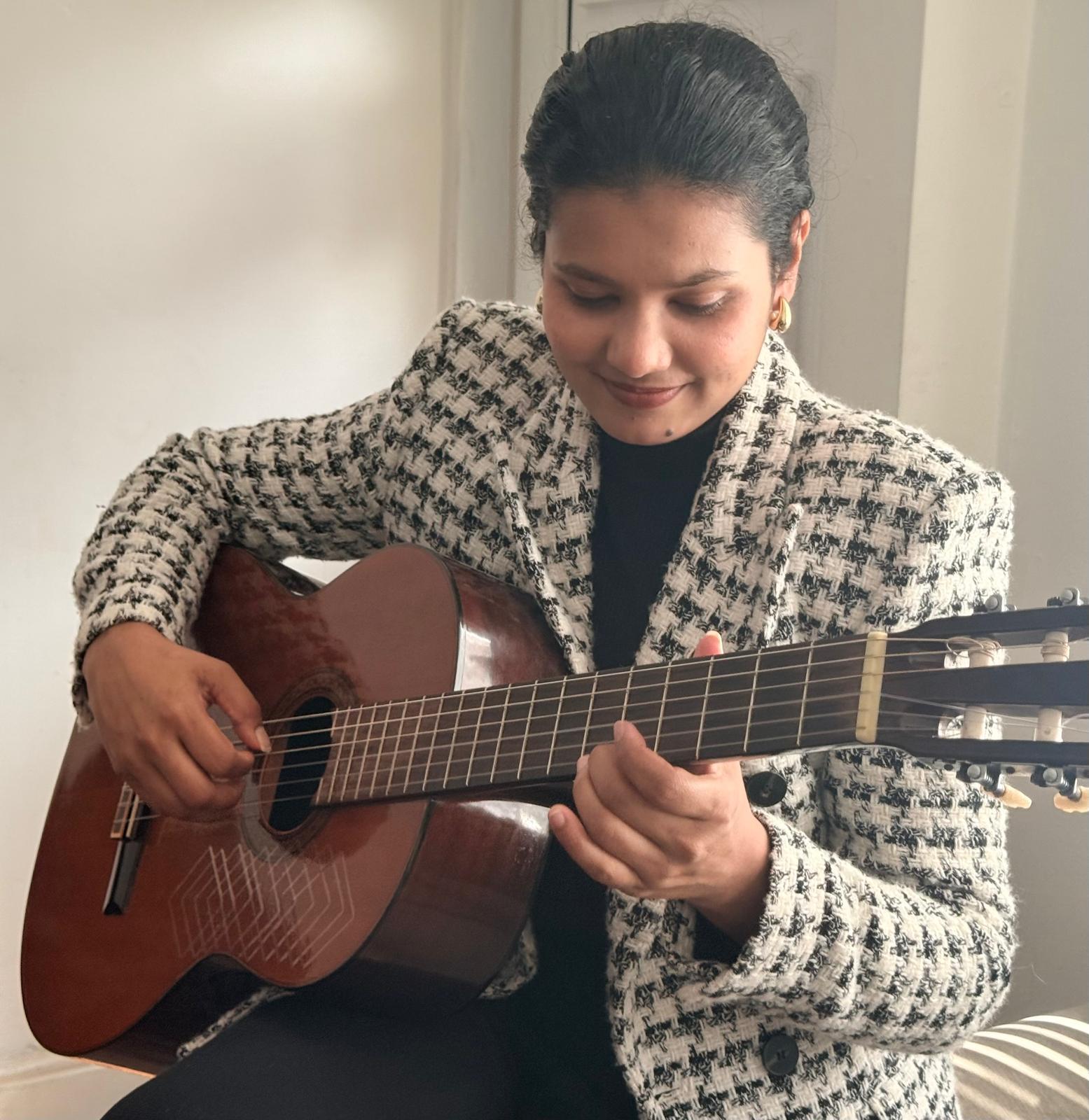 Navoda Classical Guitarist Performing